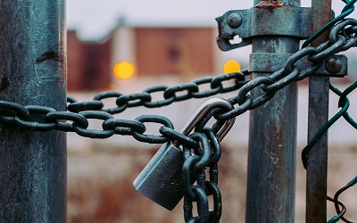 fense locked with chain and lock